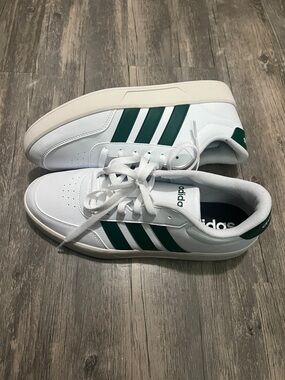 adidas : Women’s White Sneakers with Green Stripes - 8.5